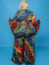 Monos de manga larga con bloques de color y pierna ancha